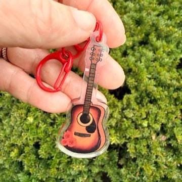 Broadway Guitar Orpheus Hades Inspired Kechain Carnation Working on A Song